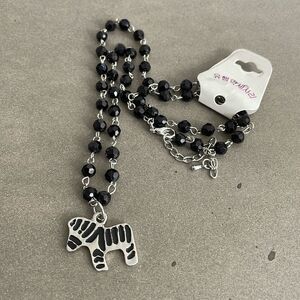 Black Beaded Necklace with Zebra Pendant